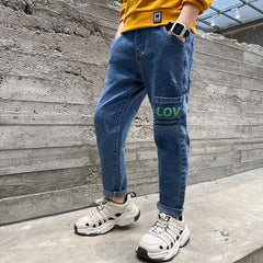 Eksotiske barnebukser elastisk slim fit middelaldrende barn