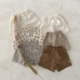 Sommerbabyklær Sommerbomull og lin Uformelle shorts for babyer Tynne og komfortable