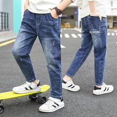 Eksotiske barnebukser elastisk slim fit middelaldrende barn