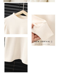 Langermet kjole til babyjente med rund hals